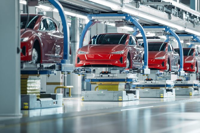EV Production Line on Advanced Automated Smart Factory. High Performance Electric Car Manufacturing. Car Batteries Installation on Electric Vehicles on Assembly line. Automotive Plant.