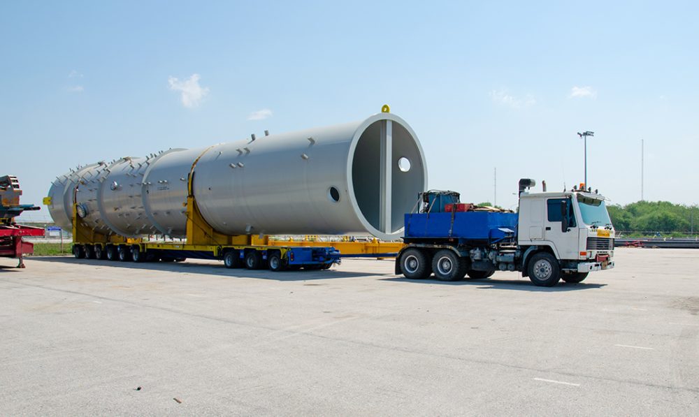 Transport of Oversize Heavy Machinery cargo truck Loading  port area